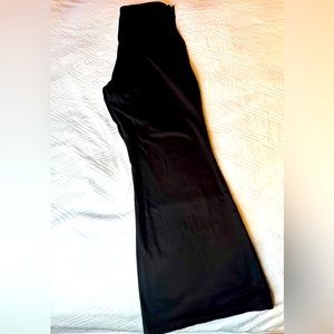 Black high waisted flared flat front pants